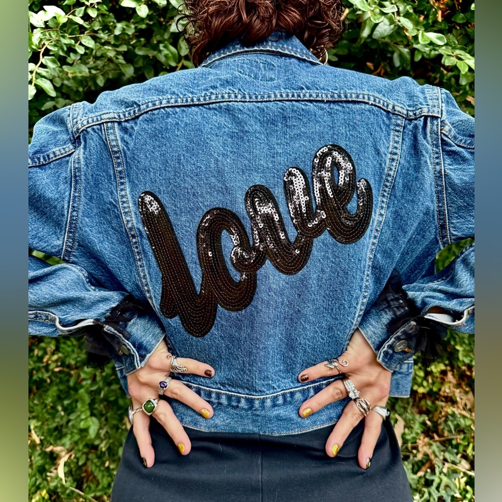 One of a kind- cropped jean jacket 
Sequin patch and ruffle details